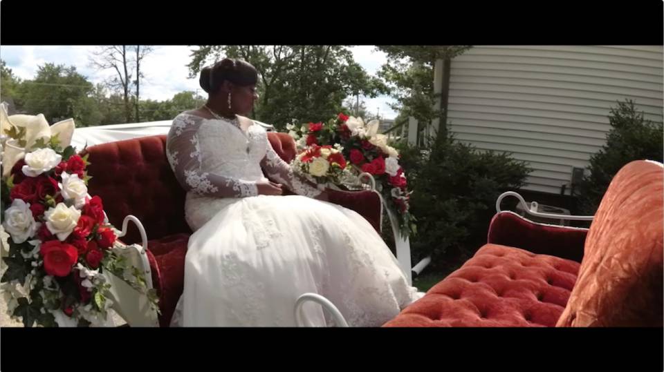 bride in horse drawn carriage